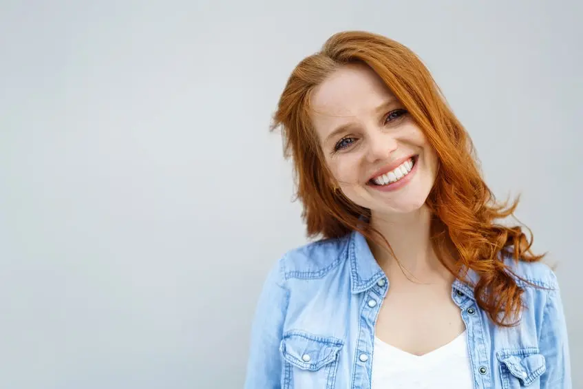 teeth whitening in Prescott AZ - Sincere young woman with a lovely smile - person smiling