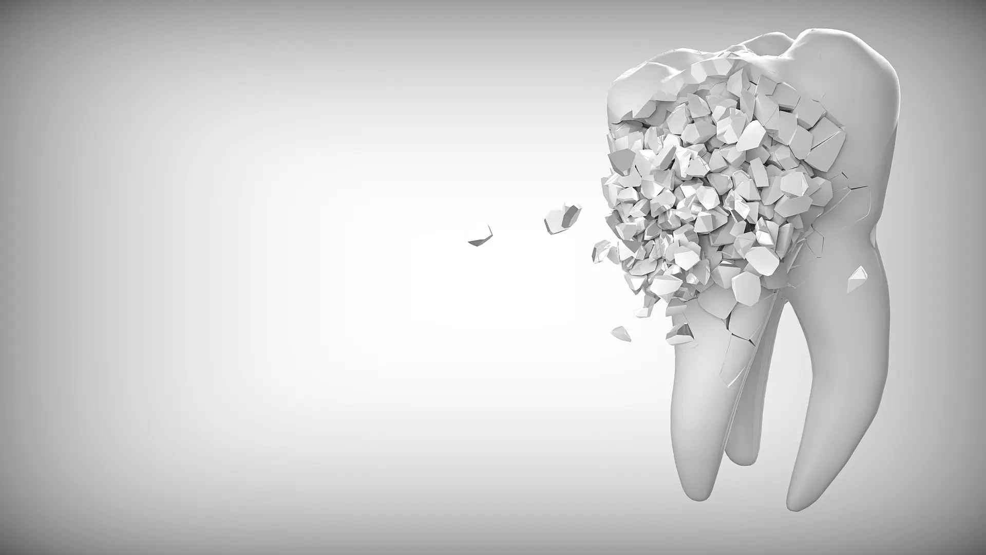 Treating Bruxism in Prescott - creative visualization of a portion of a tooth breaking into several pieces