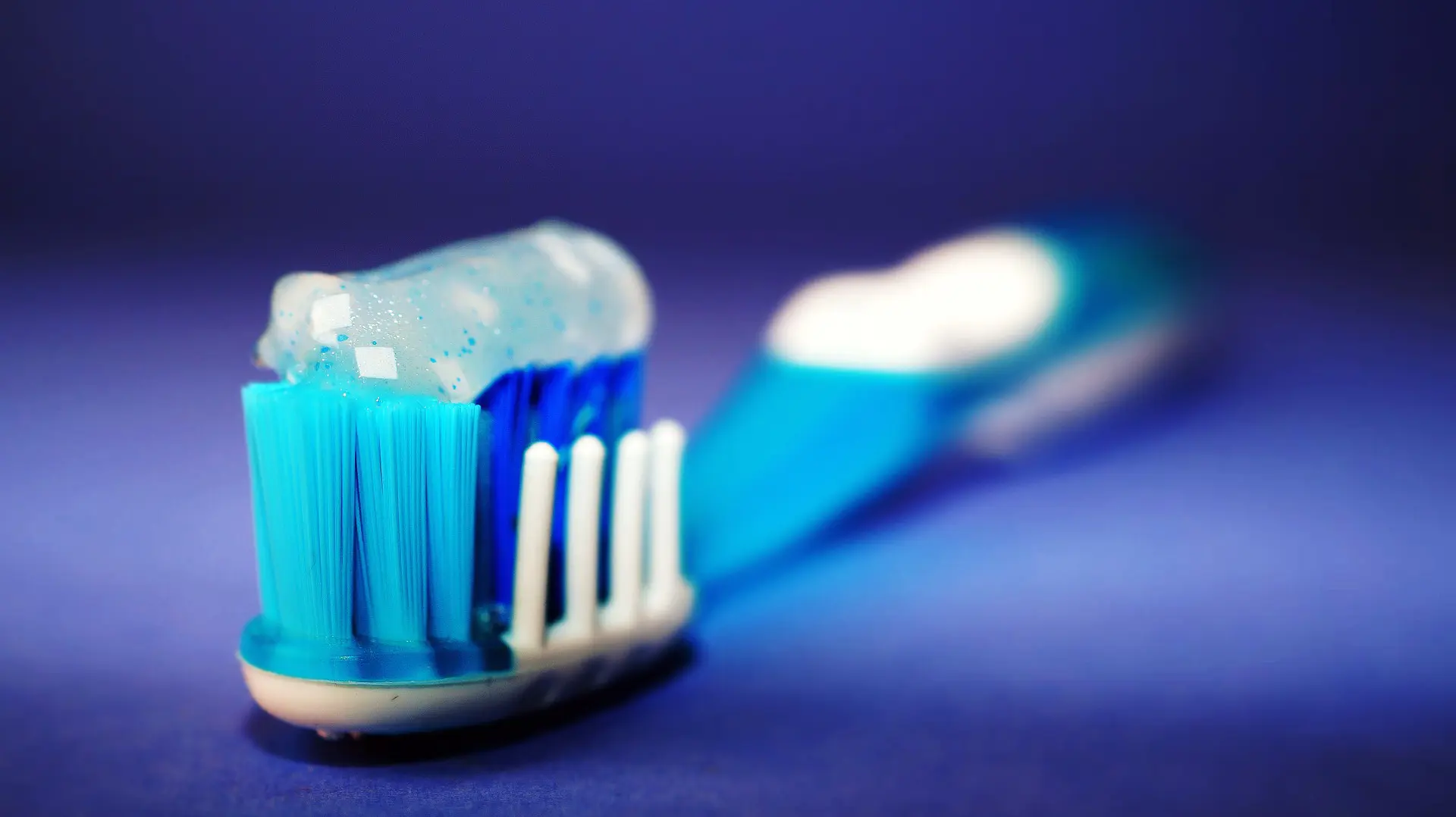 toothbrush care - toothbrush with toothpaste on it