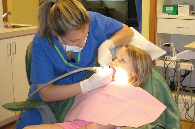 Fight Gum Disease Through Periodontal Therapy in Prescott - dentist working on child's mouth