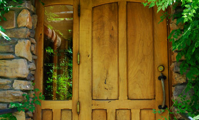 front door with surrounding greenery