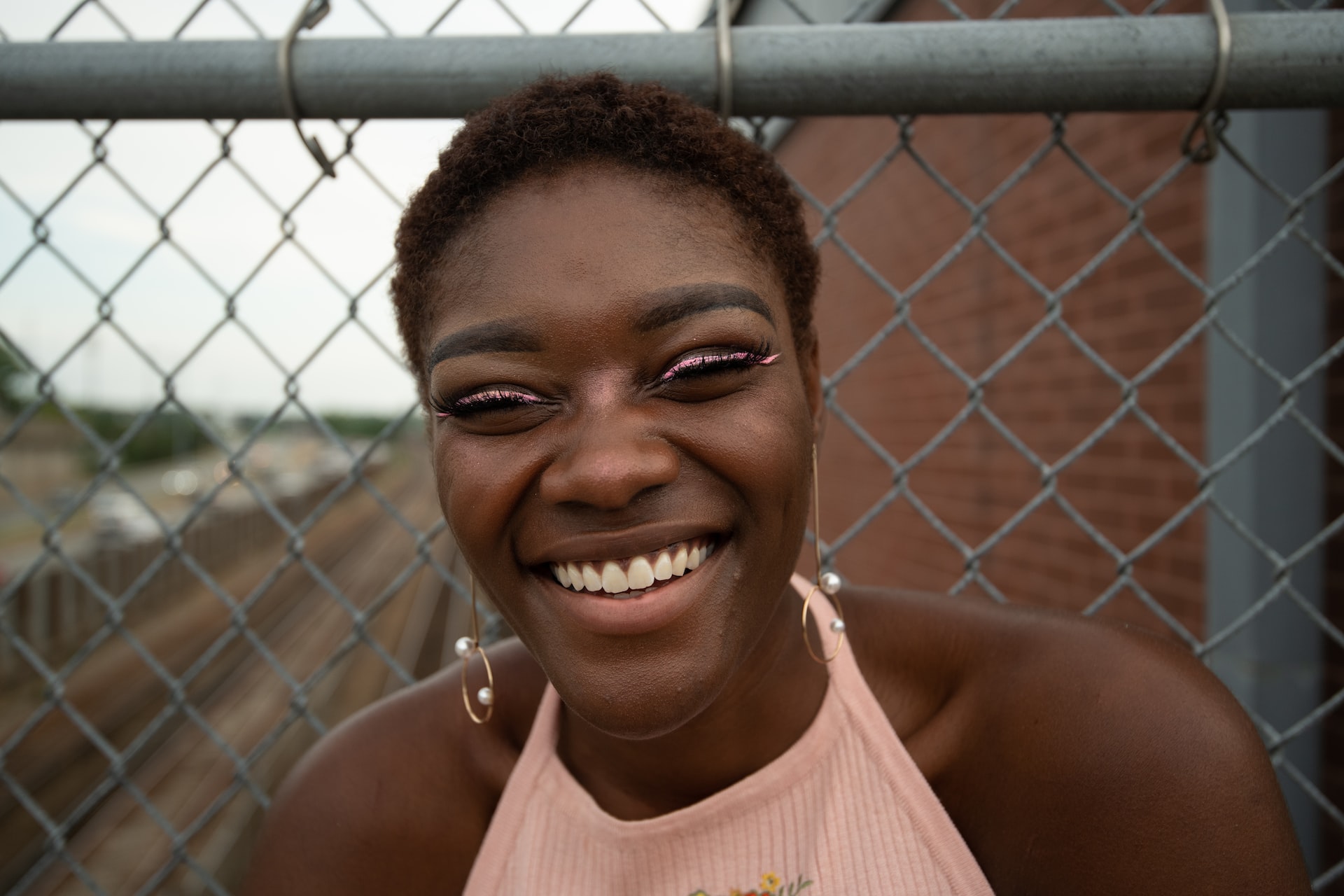 woman with a bright white smile -is hydrogen peroxide safe to whiten teeth