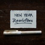 sign that says new years resolutions -dental health new year resolutions