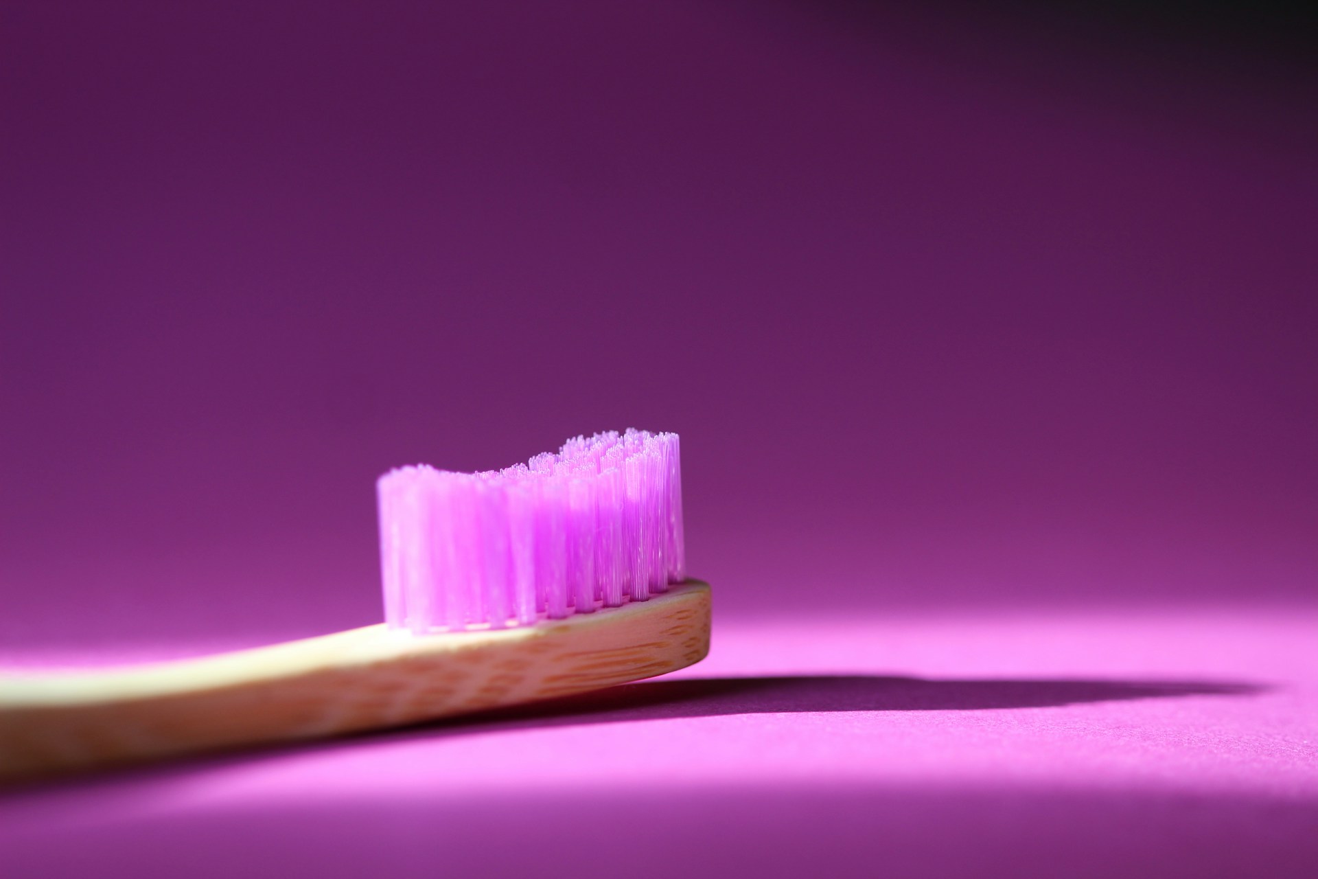 purple bristled brush on purple background - bristle strength